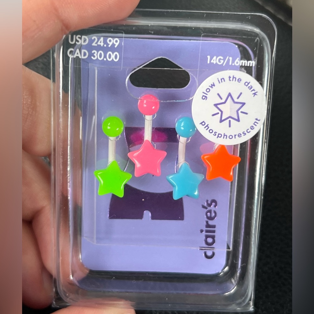 Glow in the dark star bellybutton piercing